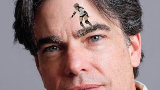 Skateboard girl Bailey Williams preps for her web redemption with a ride across Peter Gallagher's eyebrows.