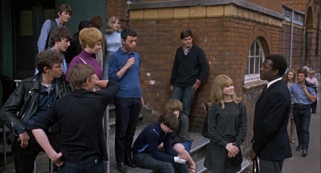 Mr. Thackeray (Sidney Poitier) wins over his working class London pupils by treating them like adults.