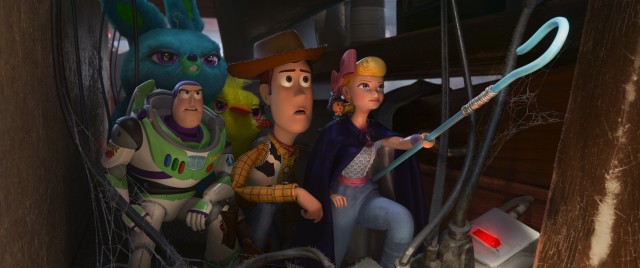 Buzz Lightyear, Woody, Bo Peep, and new friends journey through a cobweb-filled stretch of Second Chance antiques shop to rescue Forky in "Toy Story 4."