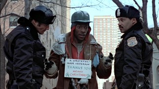 In his second film role, Eddie Murphy plays Billy Ray Valentine, a Philadelphia street beggar to whose deceptions the police are wise.