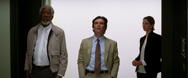 Evelyn Caster (Rebecca Hall) shows Joseph Tagger (Morgan Freeman) and FBI Agent Buchanan (Cillian Murphy) the data supercenter her late husband presides over.