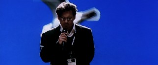 Dr. Will Caster (Johnny Depp) talks up the new technology he is developing.