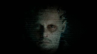 The frightening face of a dying Will Caster (Johnny Depp) takes shape from gibberish code in one of the numerous trailers included.