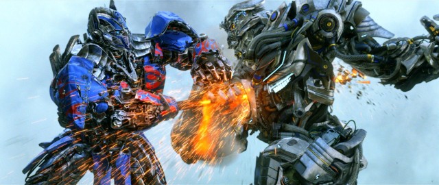 Optimus Prime strikes Galvatron in his empty soul in this visual effects action shot.