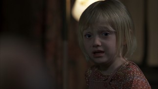 Coochie coochie coo! Baby Dakota Fanning wants her Mommy and her asthma inhalant.