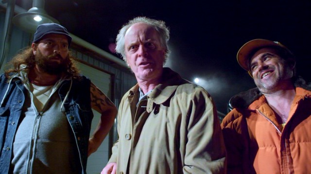 The standard issue bad guys are turkey farmer Eldridge Sump (Linden Banks, center) and his half-witted henchmen Junior (Peter New) and Buzz (Gabe Khouth).