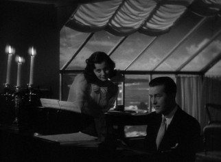 What would a ghost movie be without a little romance and an original composition?