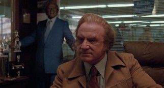 The ruthless Roy L. Fuchs (Jack Warden) wants his brother's dealership and will go to great lengths to get it.