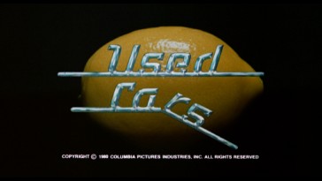 The lemon title logo that serves as cover art makes its first appearance in the Used Cars theatrical trailer.