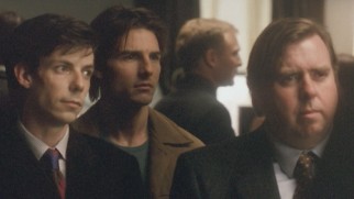 In this deleted scene, David (Tom Cruise) looks in on his own memorial service between tech support (Noah Taylor) and his lawyer (Timothy Spall).