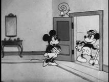 Mickey dazzles Minnie with some olden-days charm.