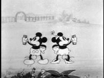 Mickey and Minnie make music with their harmonicas.