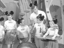 Jimmie helps the Mouseketeers form a gadget band.