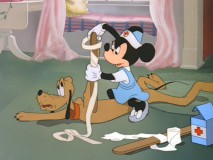 Minnie practices techniques on Pluto in "First Aiders."