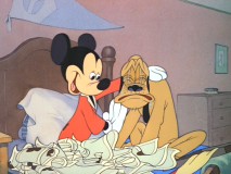 Mickey consoles Pluto in "A Gentleman's Gentleman"