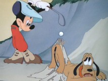 Mickey tees off of Pluto's bum in "Canine Caddy."