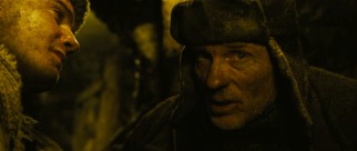 American inmate Mr. Smith (Ed Harris) shows his first sign of humanity helping Janusz avoid death while hallucinating in the Gulag mines.