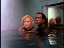 While awaiting rescue from watery captivity, Alex and Trivette can think only of Walker's past heroics in the clip-heavy "No Way Out."