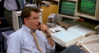 Lots of work, not much money: "Wall Street" protagonist Bud Fox (Charlie Sheen) wants more out of his job than just cold calls.