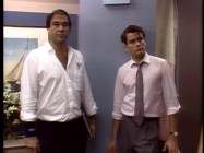 Director Oliver Stone and star Charlie Sheen stand by one another in a production footage clip from "Money Never Sleeps: The Making of 'Wall Street'."