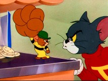 Rather than just raising his middle finger, blowing up his hand results in Jerry's cousin Muscles Mouse having an extremely enlarged fist with which to knock out Tom.