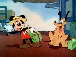 Mickey and Pluto await the train to Pomona in "Mr. Mouse Takes a Trip."