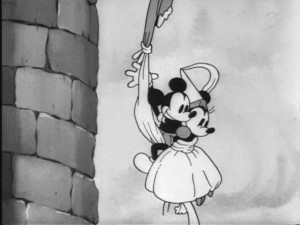 Mickey and Minnie cheerfully climb down the tower window with an impressive array of bed sheets in "Ye Olden Days."