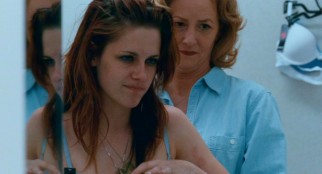 Lois (Melissa Leo) has her maternal side resurface by helping "Mallory" (Kristen Stewart) try on a bra...every teenaged girl's favorite mother-daughter activity.