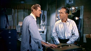 Soldiers turned music sensations Phil Davis (Danny Kaye) and Bob Wallace (Bing Crosby) have a little backstage argument over their busyness.