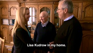 Three generations of the Barudin family welcome their famous distant relative, Lisa Kudrow of the "Friends", into their Gydnia, Poland home as subtitles clarify their accented English.
