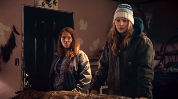 The inquiries of Ree (Jennifer Lawrence) are met with distrust and silence by relatives like Megan (Casey MacLaren).