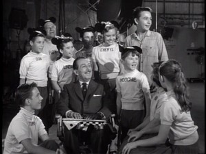Walt chills with the Mouseketeers (and Tommy Kirk) for a special anniversary "Disneyland" episode.