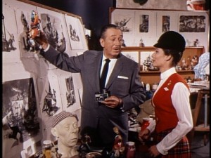 Walt shows Miss Tencennial Julie Reihm concept art at statues from a little ride called Pirates of the Caribbean in "Disneyland Tenth Anniversary Show."