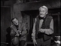 In 'Ireland' in "I Captured the King of the Leprechauns", Walt Disney listens to a story from Darby O'Gill (Albert Sharpe).