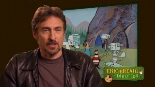 Director Eric Brevig discusses the Hanna-Barbera cartoon from which the film is adapted (in front of an image from it) in the "Yogi Bear Mash-Up."