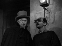 A faux-blind beggar Figueroa is part of the Magistrado's (Vinton Hayworth) secret evil plans.