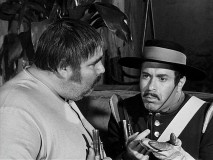 Corporal Reyes (Don Diamond) sees if anything about the soldiers' gunpowder tastes funny, before realizing he doesn't know what normal gunpowder tastes like.