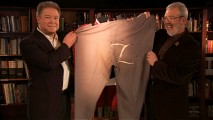 Leonard Maltin gets a big kick out of Sgt. Garcia's "girth", holding up a plus-sized pair of pants here with Guy Williams Jr.