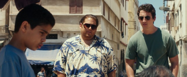 Efraim (Jonah Hill) and David (Miles Teller) soon get in over their heads arranging for arms deals in the Middle East.