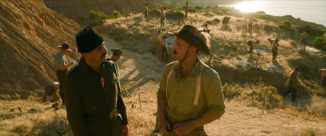 Neither Turkish major Hasan (Yilmaz Erdogan) nor Australia's Lt. Colonel Hughes (Jai Courtney) is keen on the idea of letting a father look for his sons' remains in Gallipoli.