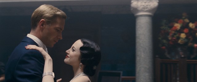 Edward VIII (James D'Arcy), the future King of England, and Wallis Simpson (Andrea Riseborough), two-time American divorce, share a dance like the star-crossed lovers they are in Madonna's "W./E."