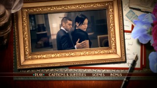 The "W./E." DVD's main menu: If Standard put his arm around you, you'd probably want a picture in a fancy frame of it too!