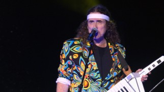 Weird Al breaks out his headband and keytar for "Money for Nothing/Beverly Hillbillies", the opening part of his central medley.