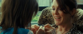 Susanna (Julianne Moore) enjoys a tender moment with her daughter.
