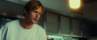 Young bartender Lincoln (Alexander Skarsgrd), Susanna's new husband, prepares Maisie an egg breakfast she doesn't want to eat.