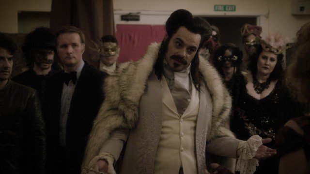 Vladislav (Jemaine Clement) makes a dramatic appearance at the annual Unholy Masquerade Ball.