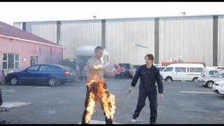Ben Frensham gets set on fire safely as part of a pyrotechnics test seen in "Behind the Shadows."