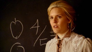 Aunt Elizabeth Thatcher (Maggie Grace) is embarrassed to discover she hasn't been practicing her teaching on an entirely empty classroom.