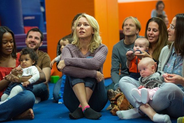 Cornelia (Naomi Watts) is the only one without a baby at this infant music class.