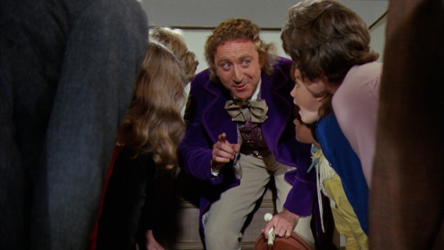 The Willy Wonka's funhouse-like Chocolate Factory requires the tour to crouch down to fit in shrinking hallway, a scene employed as the Blu-ray's one menu.
